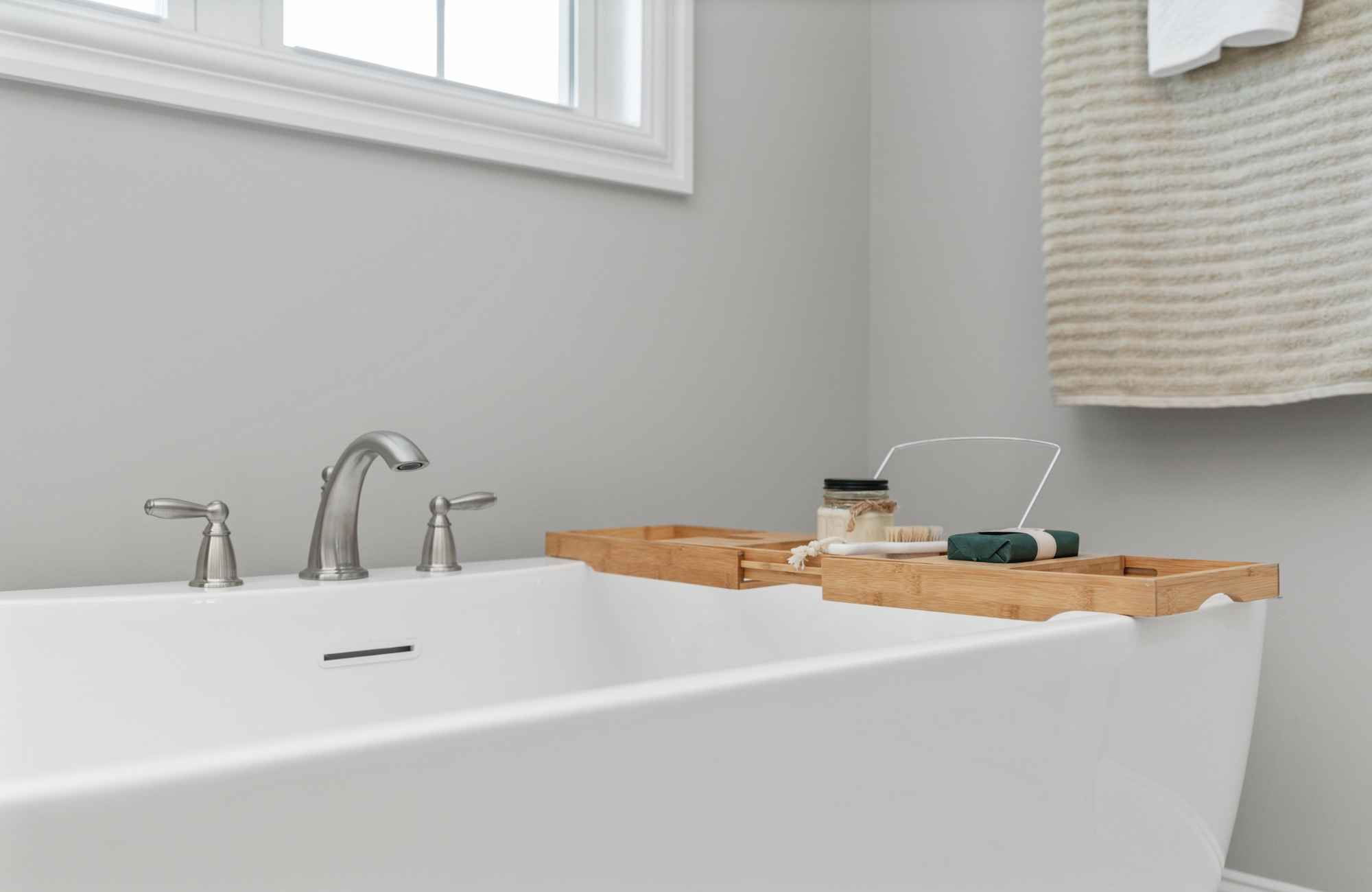 mickler-and-co-design-studio-carolina-beach-nc-4-professional-staging-tips-to-elevate-your-bathroom-freestanding-bathtub-home-staging