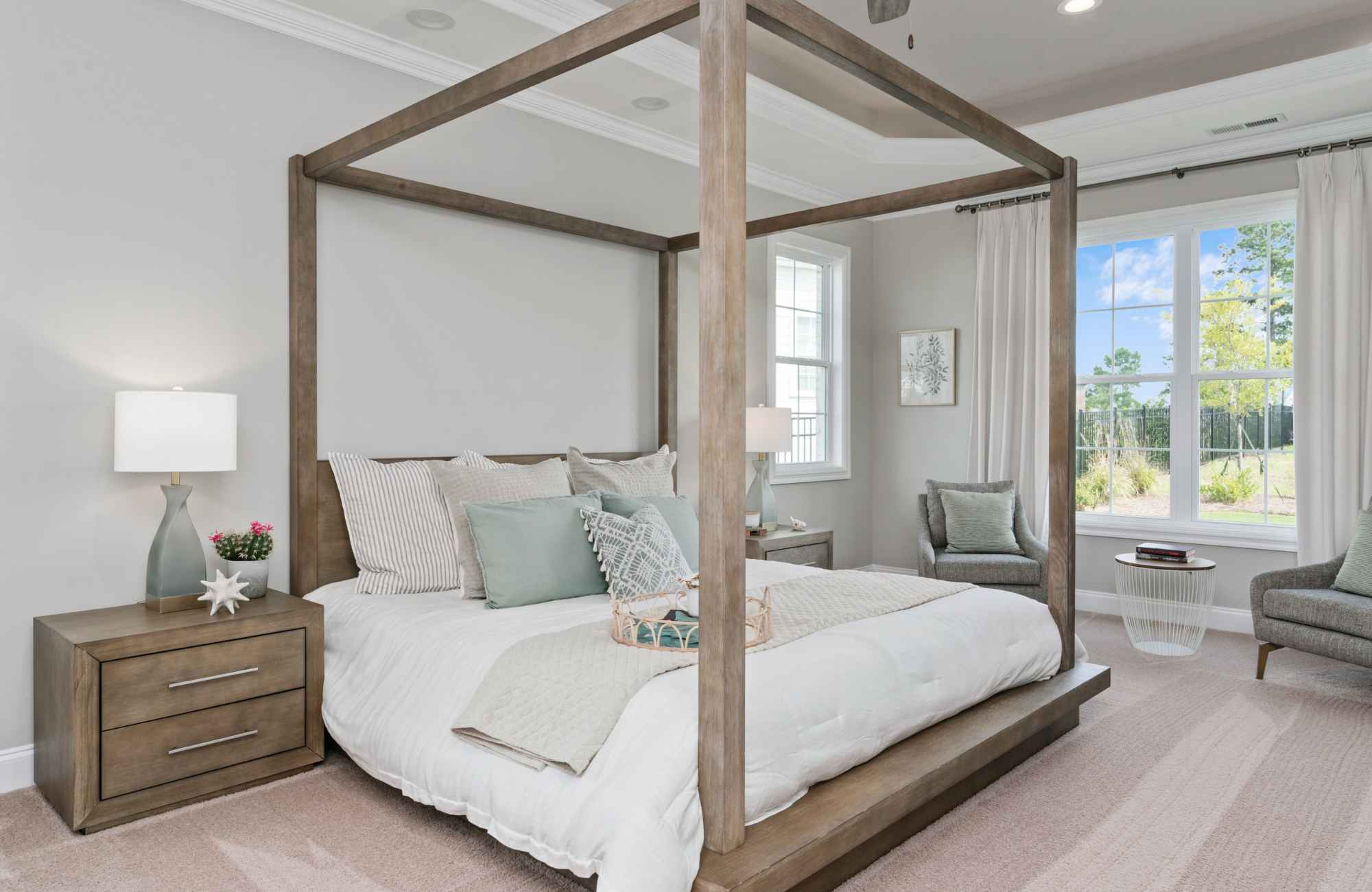 mickler-and-co-design-studio-leland-nc-smart-tips-to-make-small-spaces-appear-larger-luxury-bedroom-design-home-staging