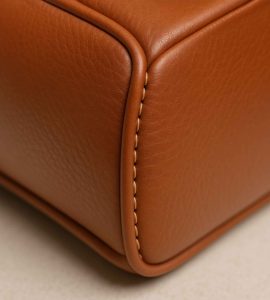 Leather Furniture: Enduring Luxury for Elevated Living 4 full-service-interior-design-sunset-beach-nc-luxury-leather-furniture-corner-of-leather-sofa-well-sewn-seam-high-quality-custom-closets